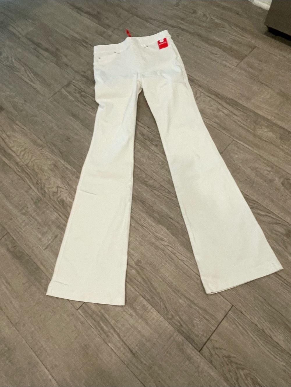Spanx White Stretch Tummy Control White Flare Bottom jeans Women’s Medium Tall